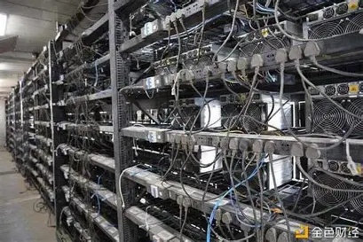 A mining farm with rows of mining rigs.