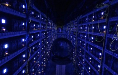 An aerial view of a large-scale crypto mining farm powered by renewable energy.